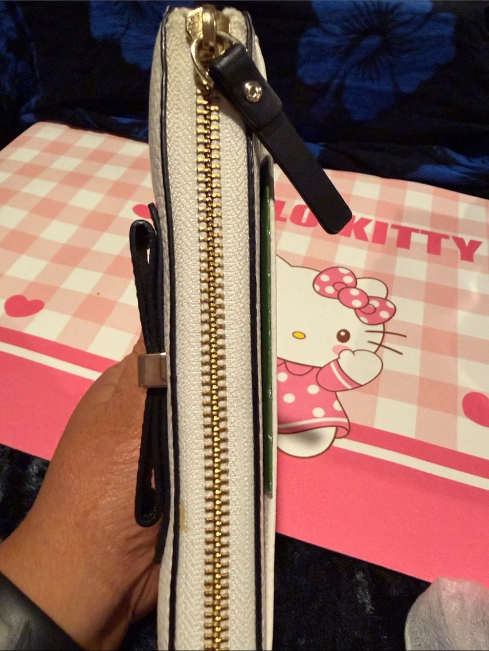 kate spade White Pebbled Leather Zip Wallet with Black Bow and Gold Bar